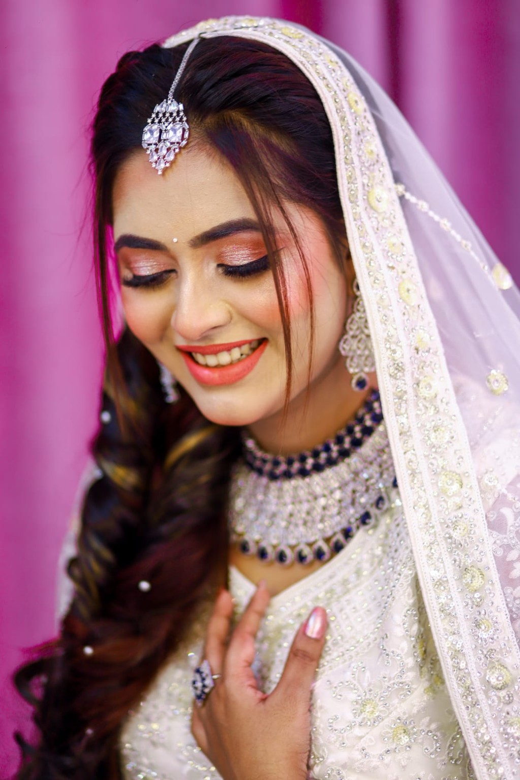 Bride smiling in bridal attire